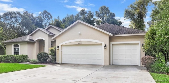 ranch-style house featuring a garage