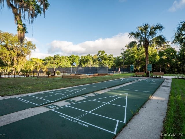 surrounding community featuring a yard