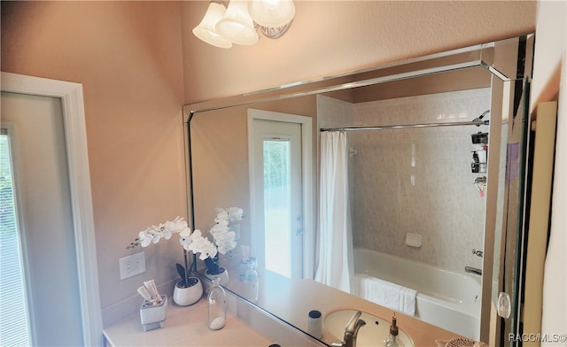 bathroom featuring shower / bathtub combination with curtain