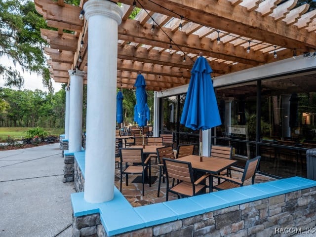 view of patio featuring a pergola