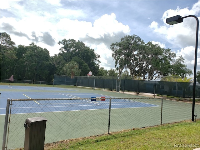 view of sport court featuring basketball court