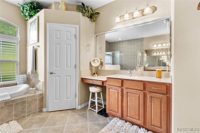 bathroom with shower with separate bathtub, vanity, and tile patterned floors