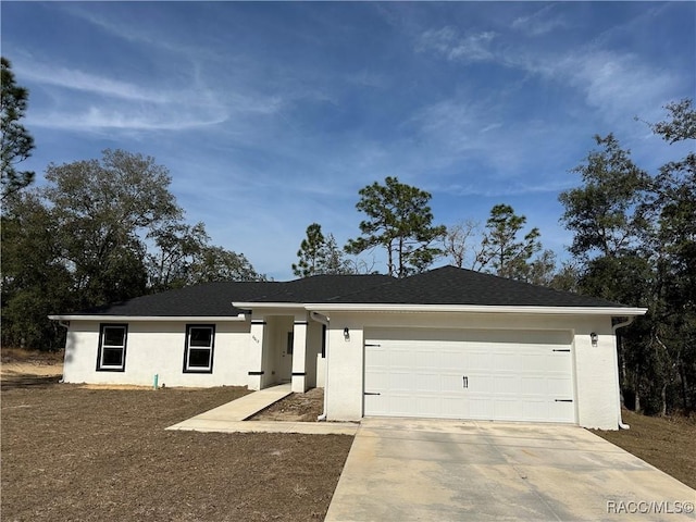 ranch-style home with a garage