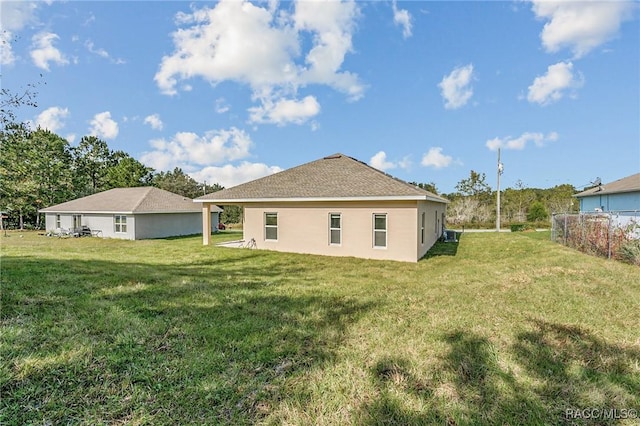 44 W Lynnhaven Pl, Citrus Springs, FL 34434 - back of house featuring stucco siding