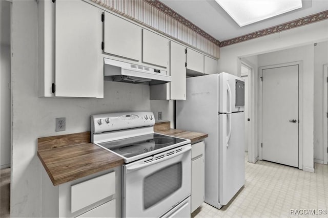 kitchen with white appliances and under cabinet range hood