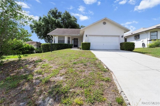 single story home with an attached garage, stucco siding, a front yard, and concrete driveway
