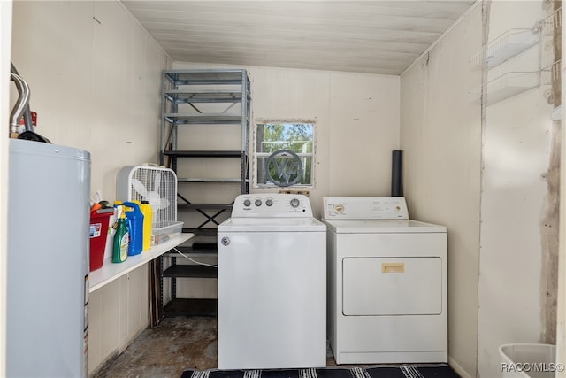 washroom featuring washer and dryer and water heater