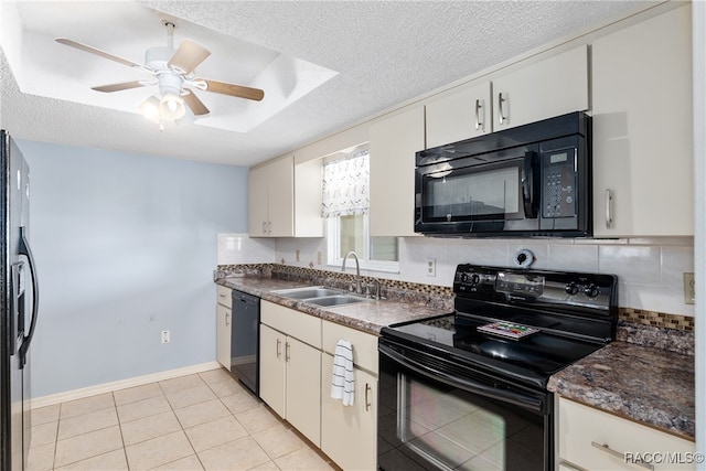 kitchen featuring ceiling fan, sink, a textured ceiling, light tile patterned floors, and black appliances