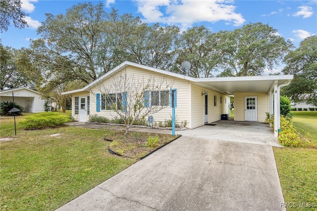 single story home featuring a carport and a front lawn