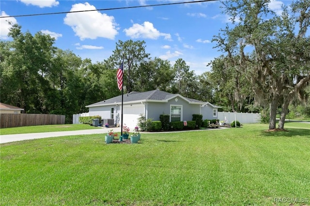 140 W Frisco Ln, Citrus Springs, FL 34434 - view of home's exterior with driveway, an attached garage, and stucco siding