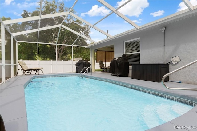 140 W Frisco Ln, Citrus Springs, FL 34434 - view of swimming pool with a patio area, grilling area, and a lanai