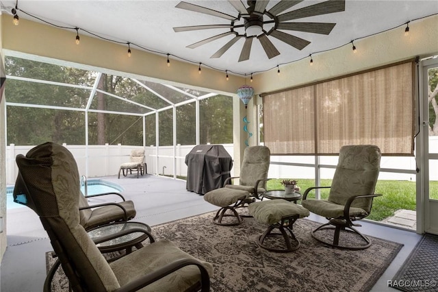 140 W Frisco Ln, Citrus Springs, FL 34434 - sunroom featuring a ceiling fan and rail lighting