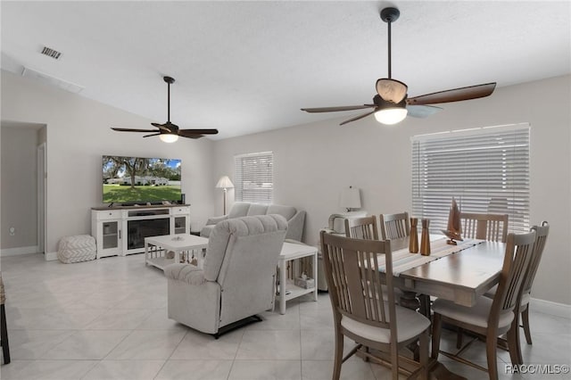 140 W Frisco Ln, Citrus Springs, FL 34434 - dining room with a ceiling fan, lofted ceiling, and light tile patterned flooring