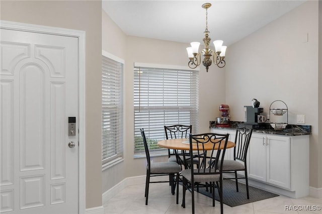 140 W Frisco Ln, Citrus Springs, FL 34434 - dining room featuring a chandelier and baseboards