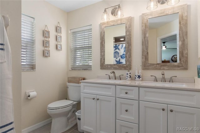 140 W Frisco Ln, Citrus Springs, FL 34434 - bathroom featuring toilet and double vanity