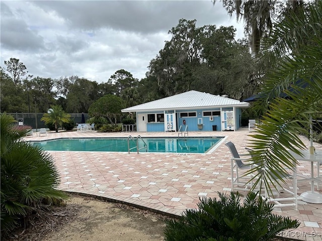 view of pool with a patio area