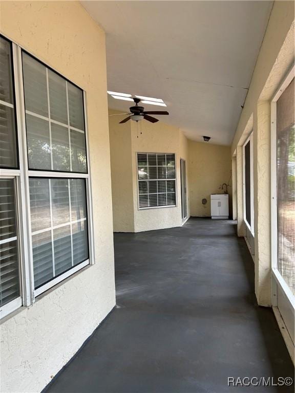 view of patio / terrace with ceiling fan