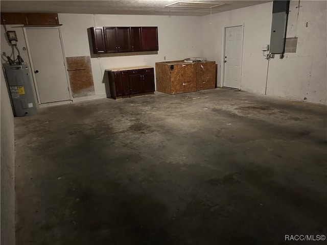 basement with electric panel and water heater