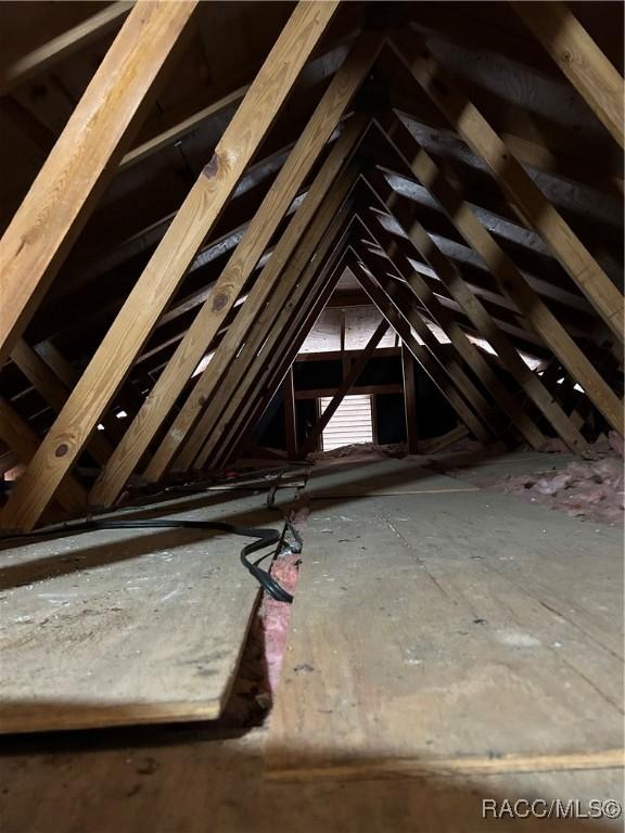 view of unfinished attic