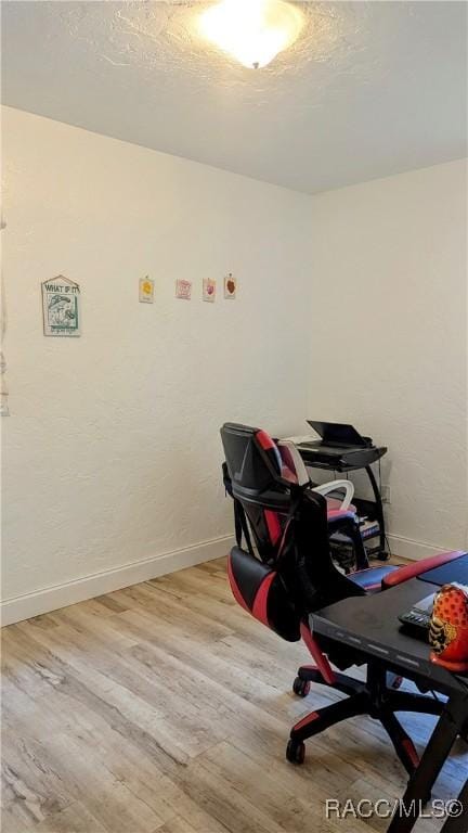 miscellaneous room featuring light hardwood / wood-style floors