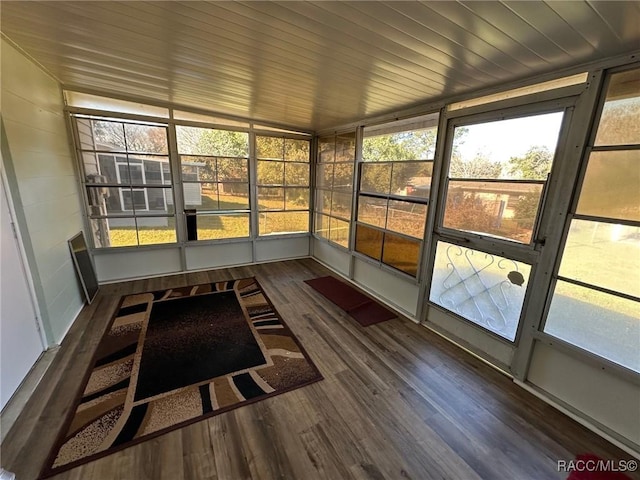 unfurnished sunroom featuring wooden ceiling