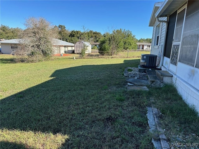 view of yard featuring central AC unit