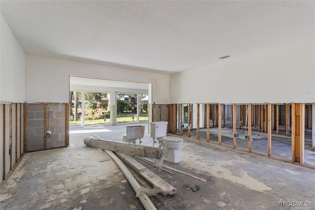 miscellaneous room featuring visible vents and a textured ceiling