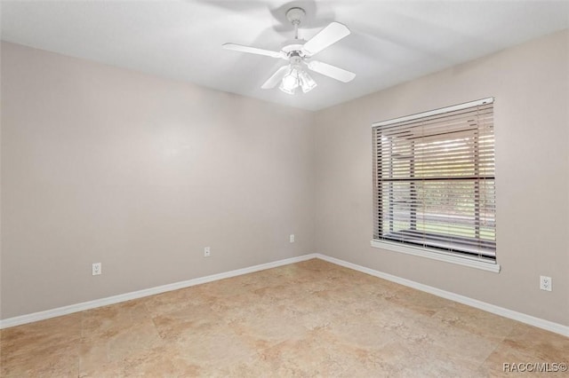 4105 W Tomahawk Dr, Beverly Hills, FL 34465 - unfurnished room featuring baseboards and a ceiling fan