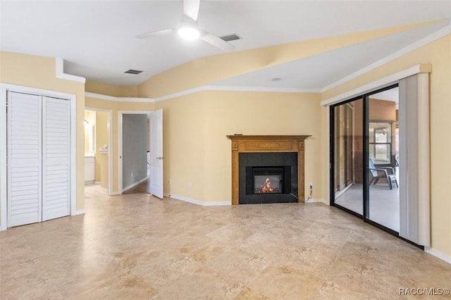 4105 W Tomahawk Dr, Beverly Hills, FL 34465 - unfurnished living room with ceiling fan, a tiled fireplace, and ornamental molding