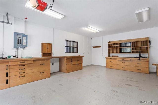 4105 W Tomahawk Dr, Beverly Hills, FL 34465 - garage with electric panel and a garage door opener