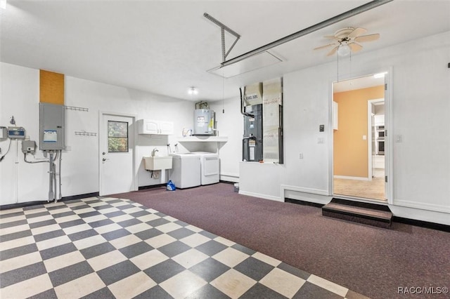 4105 W Tomahawk Dr, Beverly Hills, FL 34465 - garage featuring washing machine and clothes dryer, electric water heater, electric panel, and a ceiling fan