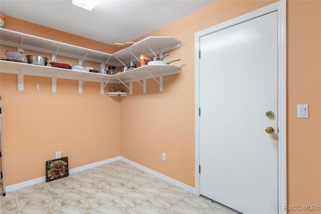 4105 W Tomahawk Dr, Beverly Hills, FL 34465 - laundry area with baseboards