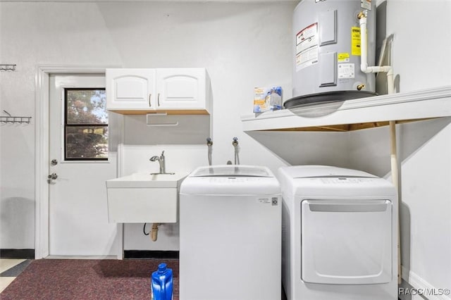 4105 W Tomahawk Dr, Beverly Hills, FL 34465 - washroom with electric water heater, washing machine and dryer, and cabinet space