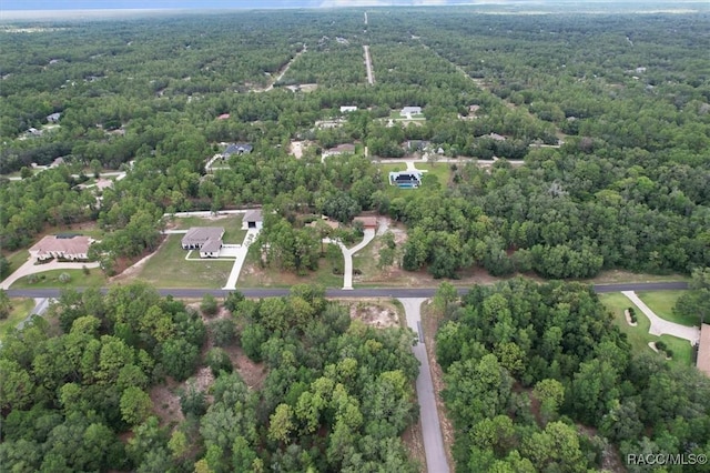 4105 W Tomahawk Dr, Beverly Hills, FL 34465 - aerial overview of property's location featuring a heavily wooded area