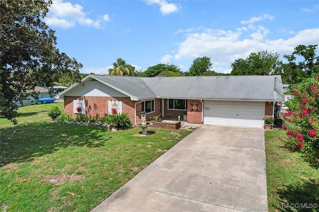 3874 N Timucua Pt, Crystal River, FL 34428 - single story home with an attached garage, brick siding, concrete driveway, and a front yard
