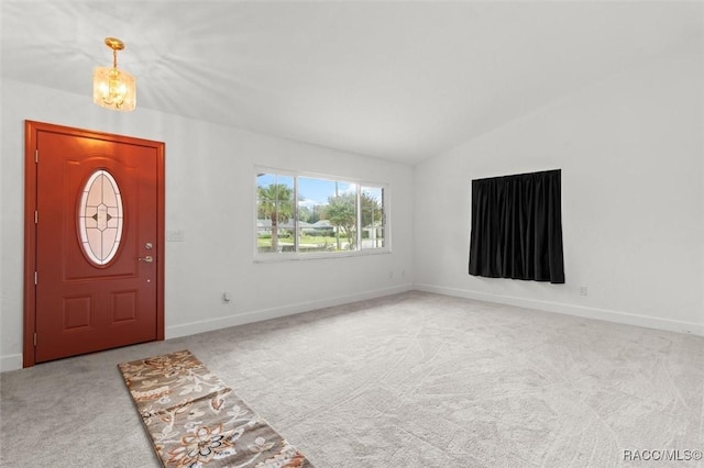 3874 N Timucua Pt, Crystal River, FL 34428 - carpeted foyer entrance with a chandelier and lofted ceiling