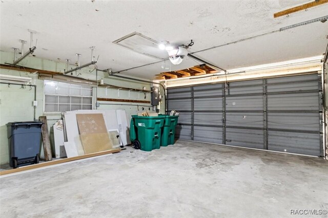 3874 N Timucua Pt, Crystal River, FL 34428 - garage featuring a garage door opener
