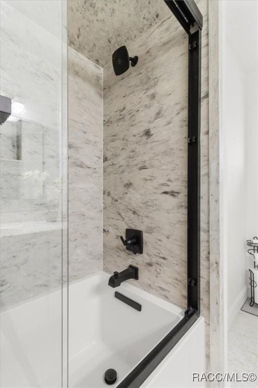 3874 N Timucua Pt, Crystal River, FL 34428 - bathroom with tub / shower combination and baseboards