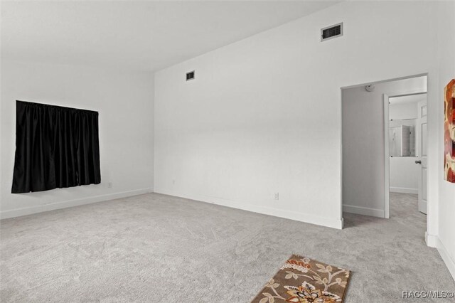 3874 N Timucua Pt, Crystal River, FL 34428 - empty room with carpet floors and baseboards