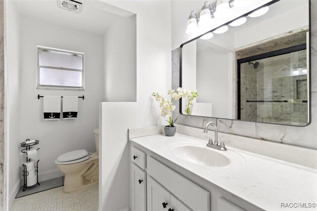 3874 N Timucua Pt, Crystal River, FL 34428 - bathroom with vanity, a stall shower, and tile patterned flooring