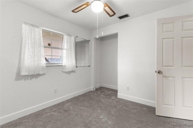 3874 N Timucua Pt, Crystal River, FL 34428 - unfurnished bedroom featuring carpet and a ceiling fan