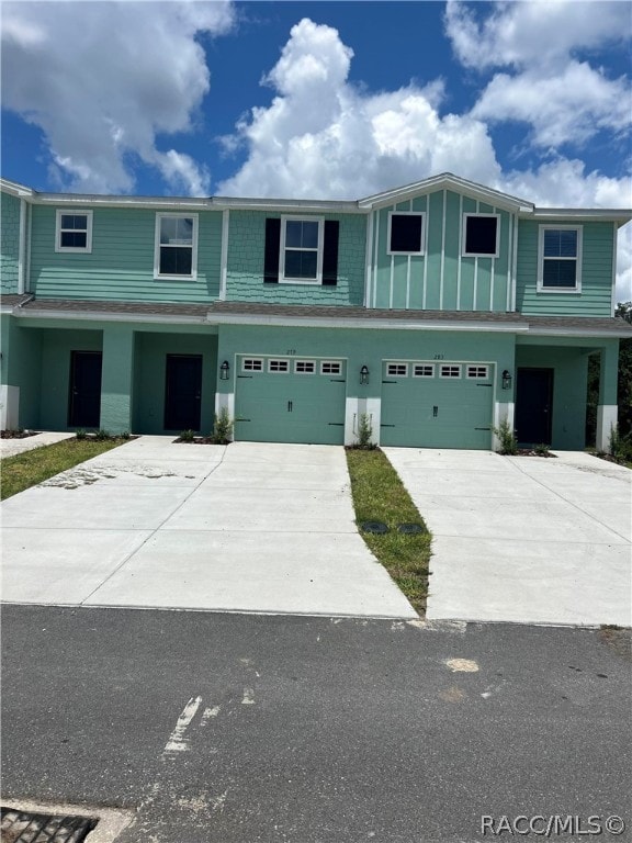 view of front of property with a garage