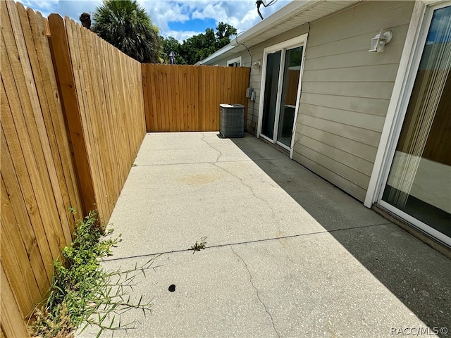 view of patio with central AC