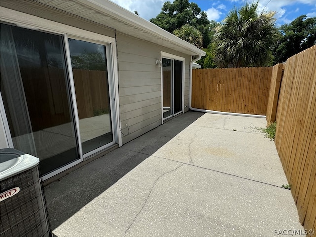 view of patio / terrace featuring central AC unit