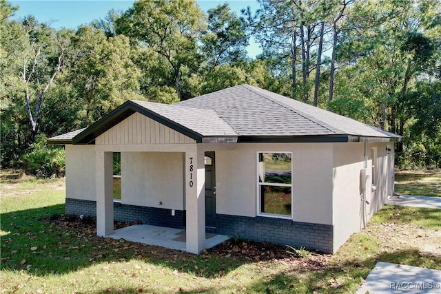 view of property exterior featuring a yard