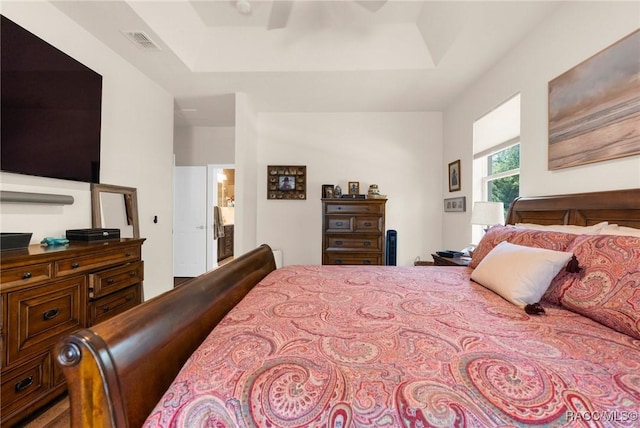 2056 W Learwood Pl, Beverly Hills, FL 34465 - bedroom with a raised ceiling and a ceiling fan