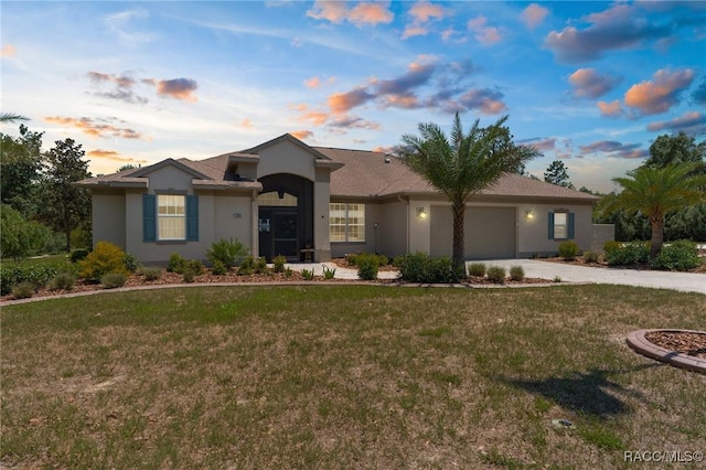 2056 W Learwood Pl, Beverly Hills, FL 34465 - ranch-style house featuring stucco siding, concrete driveway, a garage, and a front yard