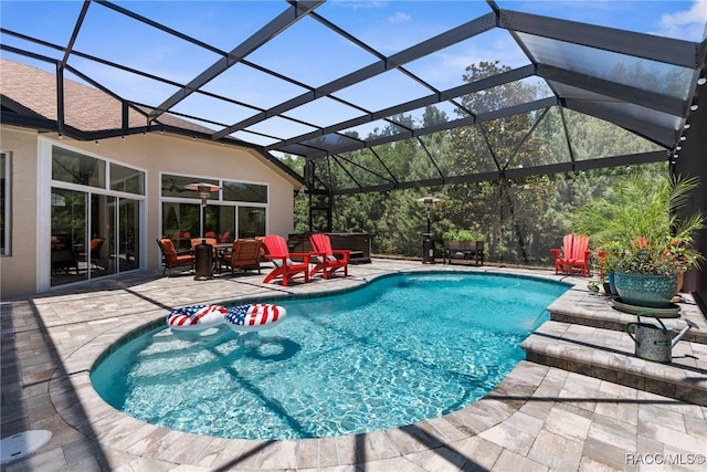 2056 W Learwood Pl, Beverly Hills, FL 34465 - swimming pool featuring a patio, a hot tub, and glass enclosure
