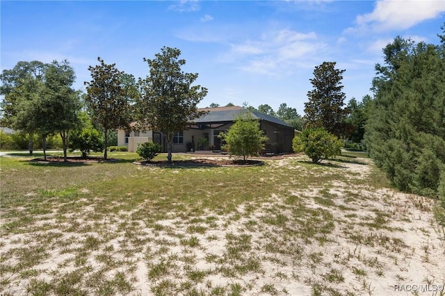 2056 W Learwood Pl, Beverly Hills, FL 34465 - view of grassy yard with a lanai