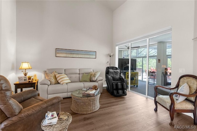 2056 W Learwood Pl, Beverly Hills, FL 34465 - living room with high vaulted ceiling and wood finished floors